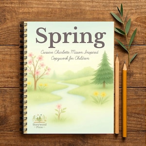 May include: A white ceramic mug with a black handle and the text "But First, Coffee" in a black, bold font. The mug is on a white surface.