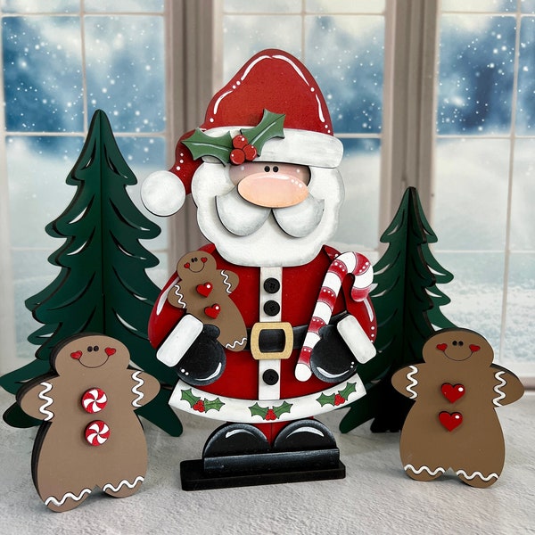 Papai Noel pintado à mão segurando um boneco de gengibre e uma bengala de doces, decoração de lareira de Natal