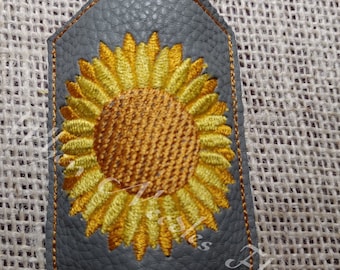 Bordado de la máquina en el aro girasol mano desinfectante titular