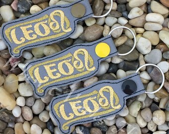 En el aro Leo Zodiac signo Snaptab / Keyfob / keychain Machine Embroidery Design