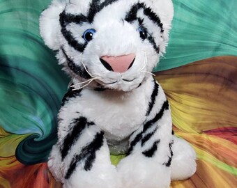 stuffed white tiger with blue eyes