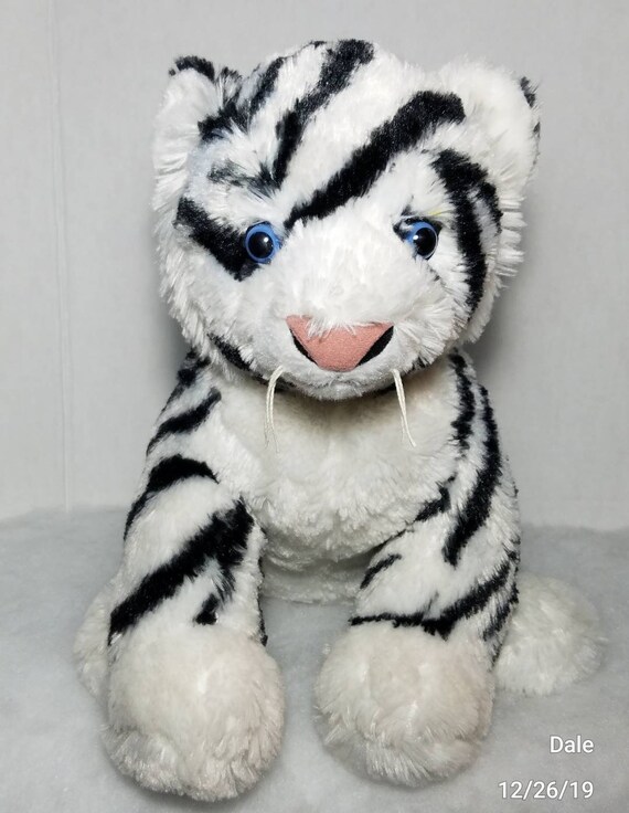 stuffed white tiger with blue eyes