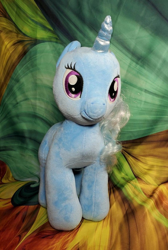 reversible dinosaur plush