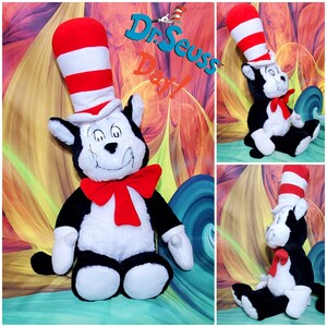May include: A plush toy of the Cat in the Hat from Dr. Seuss. The cat is wearing a red and white striped hat and a red bow tie. The cat is sitting on a colorful background.