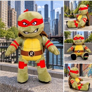 May include: A plush toy of a green turtle character wearing a red eye mask and red arm and leg bands. The character has a yellow chest plate, a brown belt with a circular buckle featuring the letter R, and a brown shell on its back.