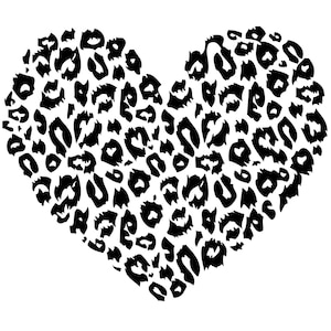 May include: A black and white heart-shaped design with a leopard print pattern.