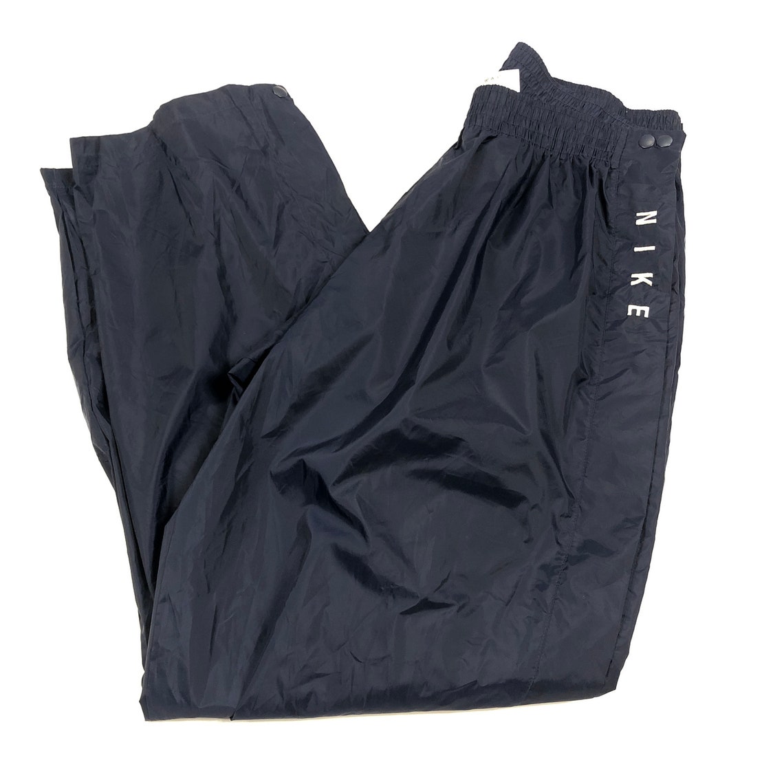 white nike windbreaker pants