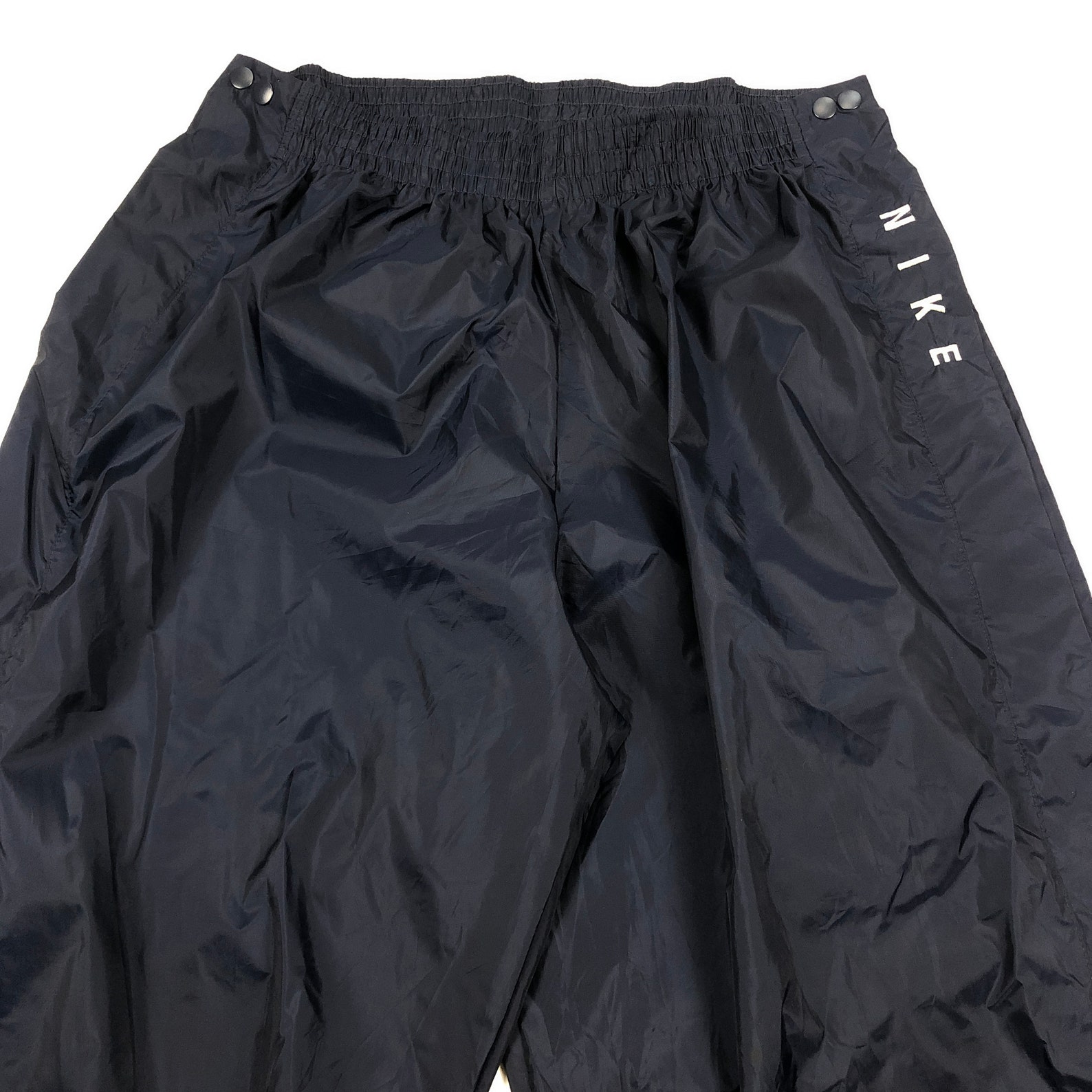 white nike windbreaker pants