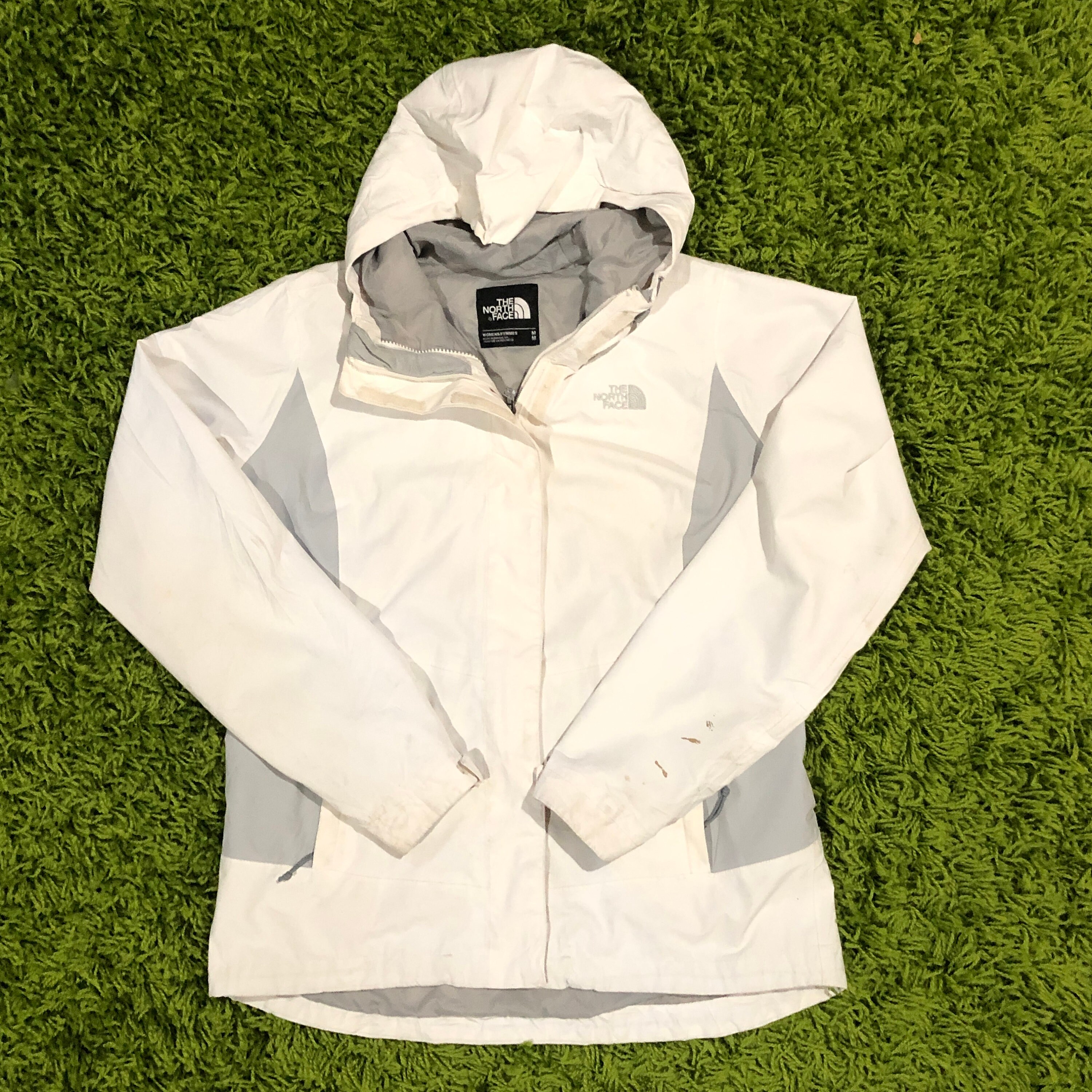 white north face jacket windbreaker