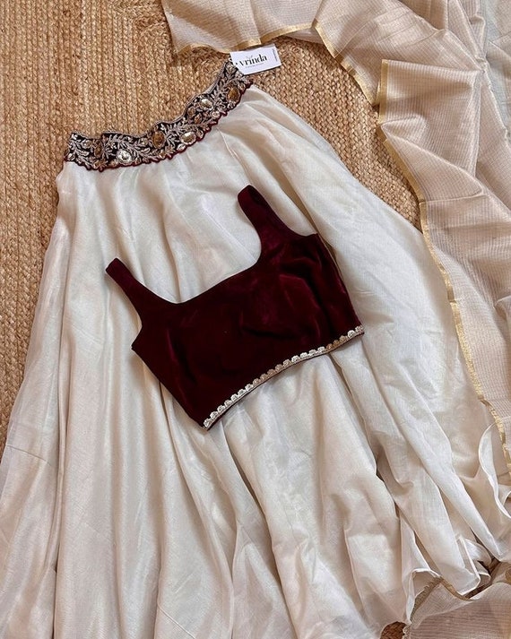 Ivory Organza Lehenga With Velvet Blouse and Embroided Belt With