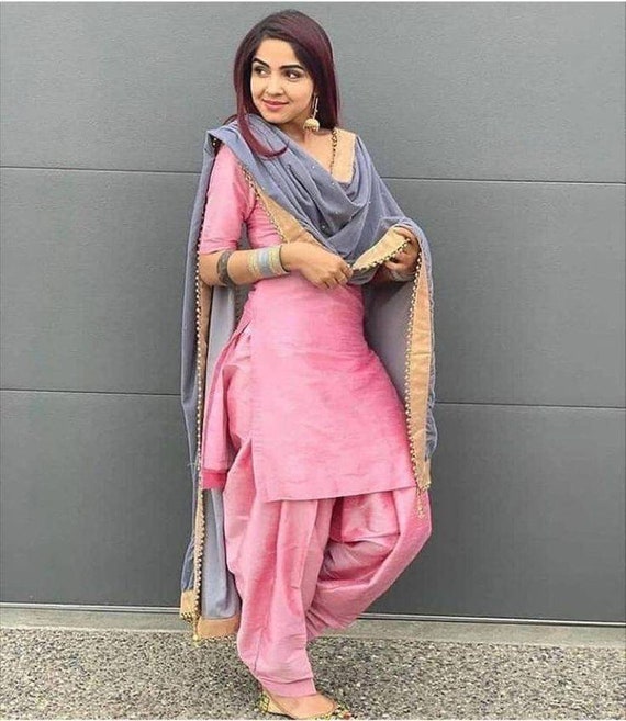 Combination of a light grey suit and a bright pink colour dupatta is  everything a perfect at… | Designer dresses indian, Dress indian style,  Indian designer outfits