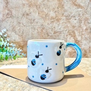 Handmade Bee Mug: Hand-Painted Ceramic Coffee Cup with Blue Handle