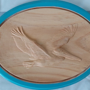 Carved Pelican Plaque