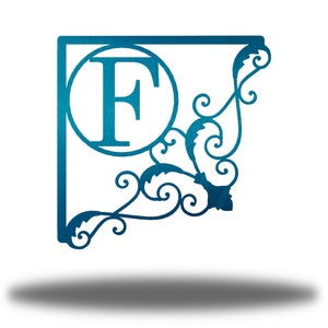 May include: A blue metal monogram sign with a decorative scroll design and the letter "F" in a circle.