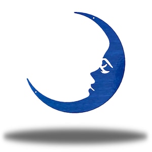 May include: A blue metal crescent moon wall decor with a stylized face cutout.