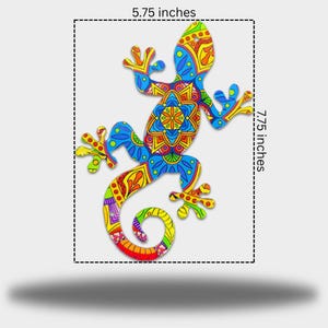 May include: A decorative metal gecko, 14.6 cm wide and 19.7 cm tall, with a bright, patterned design. The artwork features a gecko shape with blue, yellow, red, and orange colors. Suitable for indoor or outdoor display.