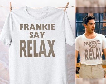 May include: White t-shirt with the text "Frankie Say Relax" printed in brown on the front.