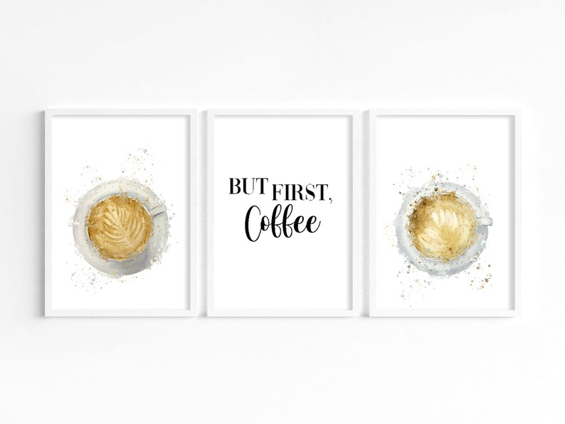 May include: Three framed prints with a watercolor design. The center print has the text "BUT FIRST, COFFEE" in black cursive font. The left and right prints feature a white coffee cup with a latte design and a splash of gold paint.
