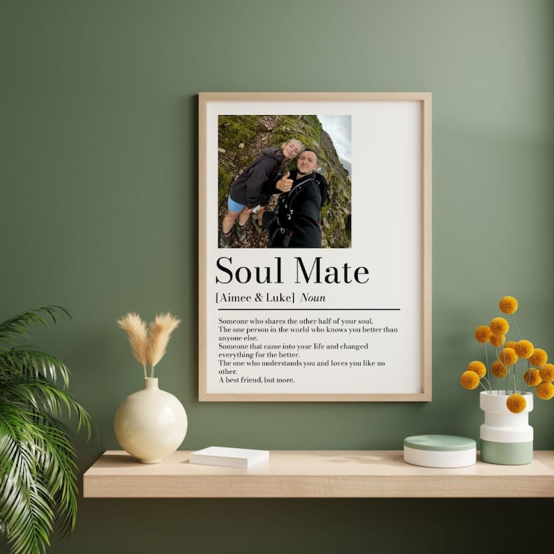 May include: A framed print with the words "Soul Mate" and a definition. The print includes a photo of two people and the names "Aimee & Luke." The definition describes a soulmate as a best friend, but more.