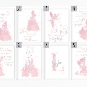 May include: Set of eight pink watercolor prints with inspirational quotes and princess-themed illustrations. The quotes include "Be your own type of beautiful", "Dream is a wish that your heart makes", "All you need is faith, trust, and a little bit of fairy dust", "Pour the one who can fill the world full of sunshine", "If you dream a thing more than once, it's sure to come true", "Princess Layla", "Layla", and "Venture outside your comfort zone, the rewards are worth it".
