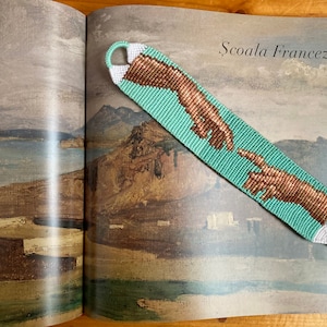 Bookmark knotted &quot;The Creation of Adam&quot;