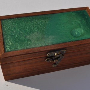 Small jewellery or keepsake box made from walnut and green resin