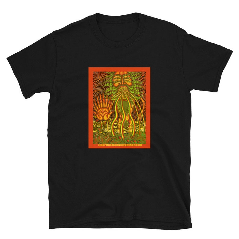 May include: Black t-shirt with a graphic print of a green and yellow creature with a red background. The text "martinetrangeweather.com" is printed at the bottom of the graphic.