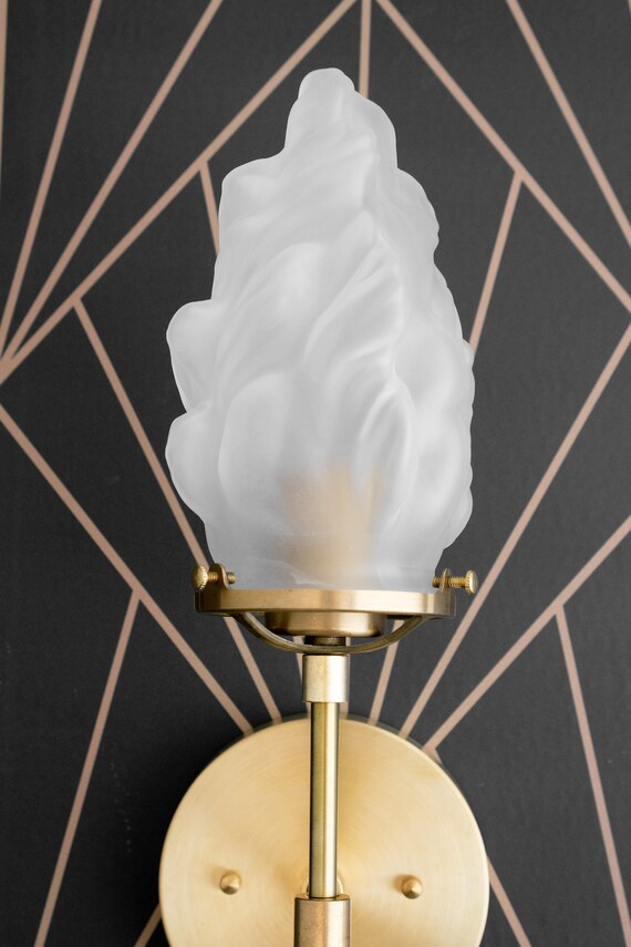 Flame sconce deals