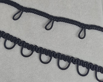 Black button loop trim for dress. Two-style trim with elastic loops for your clothes or crafts.