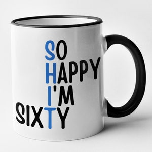 May include: White ceramic mug with a black rim and handle. The mug has black text that reads "SO HAPPY I'M SIXTY" with the "I" in blue.