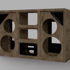 Könnte beinhalten: Ein rechteckiges Lautsprechergehäuse aus Holz mit einer hellbraunen Holzmaserung. Die Frontplatte enthält zwei große kreisförmige Ausschnitte auf jeder Seite, zwei rechteckige mittlere Öffnungen und zwei schwarze dreieckige Akzente.