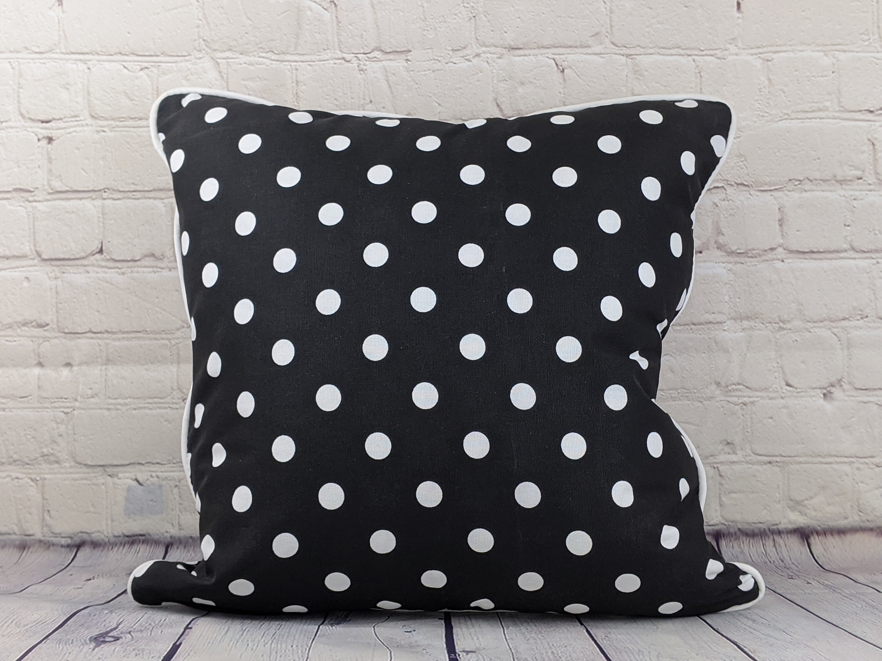 black polka dot pillow