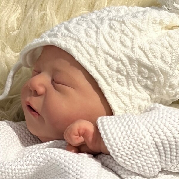 Made from generic Chinese kit - no coa. Fully painted & partly rooted newborn Reborn doll- a complete doll! Hair included to finish rooting