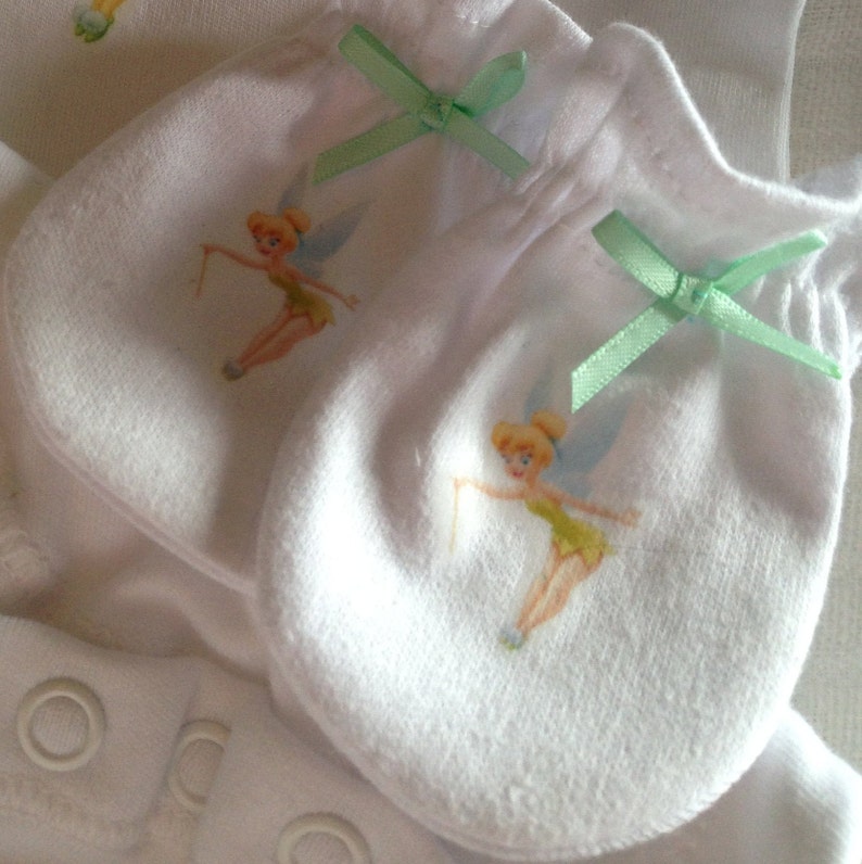 Any 3 pairs for 10 pounds 1 pair babys newborn Tinkerbell cotton scratch mittens. image 1