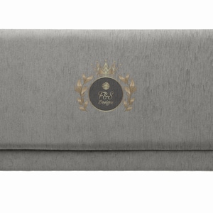 May include: A gray fabric headboard with a gold embroidered logo that says "F&S Designs" with a crown above the text.