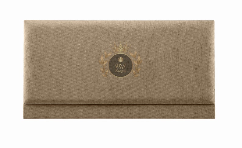 May include: A brown fabric envelope with a gold crown and laurel wreath design. The text "F&S Designs" is inside the wreath.