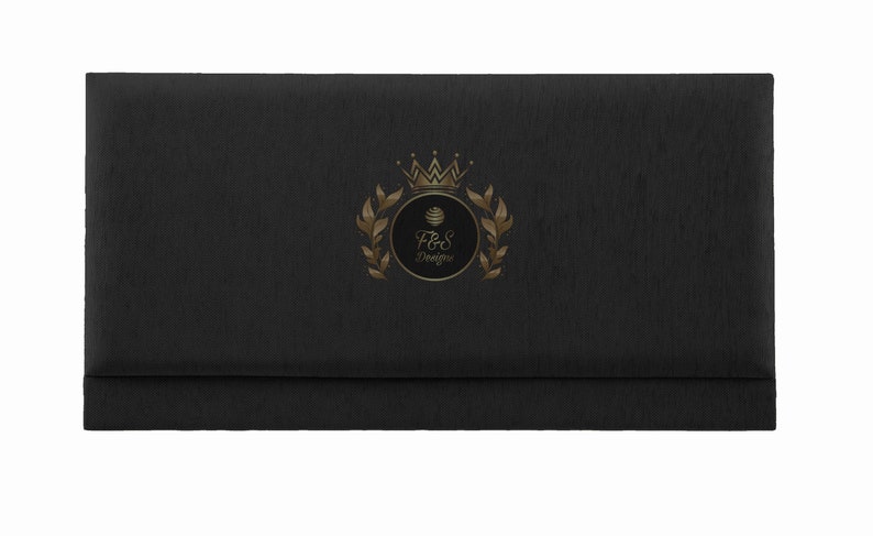 May include: Black envelope with a gold logo featuring a crown, a circle with the text "F&S Designs", and a laurel wreath.