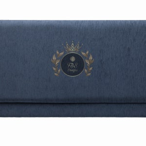 May include: A blue fabric headboard with a gold embroidered logo that says "F&S Designs" with a crown and leaves.