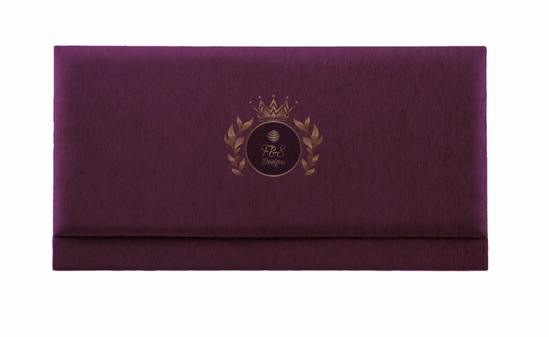 May include: A deep purple envelope with a gold embossed logo featuring a crown, leaves, and the text "F&S Designs".