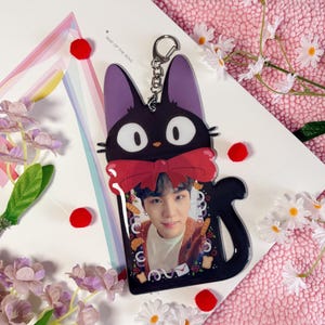 Portatarjetas fotográficas con forma de gato negro