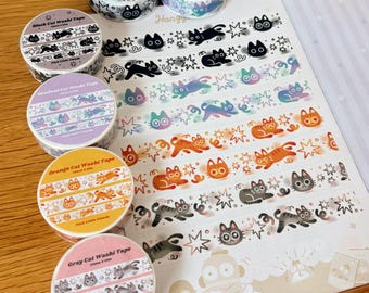 Puede incluir: Cuatro rollos de cinta washi etiquetados como Black Cat, Gradient Cat, Orange Cat y Gray Cat Washi Tape, cada uno de 15mm x 10m. Las cintas presentan patrones repetitivos de gatos y estrellas en colores negro, degradado, naranja y gris.