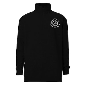 May include: Black quarter-zip sweatshirt with a white embroidered logo of a circle with a triangle inside and three arrows pointing inward.