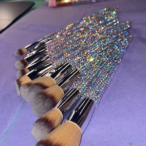 Glamorous Pink blinged out make up brushes.