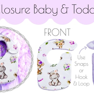 May include: A white baby bib with a purple floral and animal print on the front. The back of the bib is a solid purple colour. The bib has a side closure that can be snaps or hook and loop.