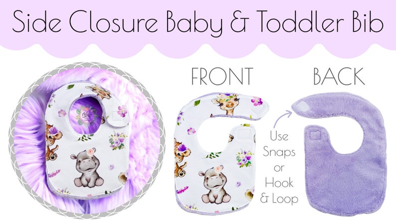 May include: A white baby bib with a purple floral and animal print on the front. The back of the bib is a solid purple colour. The bib has a side closure that can be snaps or hook and loop.