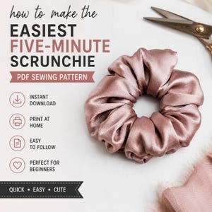 May include: A dusty rose satin scrunchie next to a pair of metal scissors. The text reads: how to make the EASIEST FIVE-MINUTE SCRUNCHIE PDF SEWING PATTERN, INSTANT DOWNLOAD, PRINT AT HOME, EASY TO FOLLOW, PERFECT FOR BEGINNERS, QUICK • EASY • CUTE.
