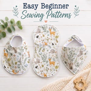 May include: Three baby bibs and a burp cloth featuring a woodland animal print with deer, rabbits, and foliage on a white background. The text "Easy Beginner Sewing Patterns" is displayed at the top of the image above the fabric items.