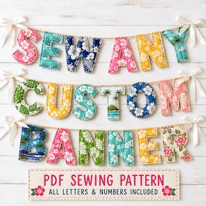 May include: A fabric banner featuring stuffed letters in various tropical floral patterns, including pink, yellow, blue, and green hibiscus prints. The letters are strung on twine with white ribbon bows at the ends. Text reads: PDF SEWING PATTERN.