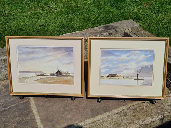 A Pair of Original Watercolours by George Farrier of Estuary Scenes with Boathouses.  Signed, Mounted and Framed.