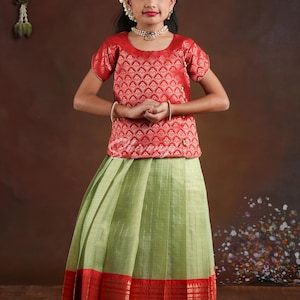 Shivangi clothing Pattu Pavadai Designs for Girls in Red and Green